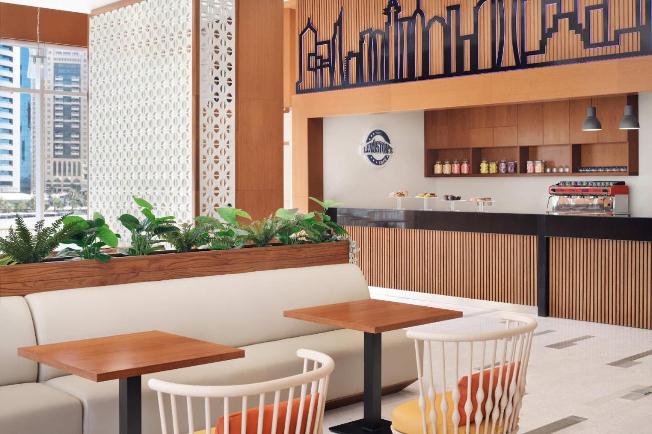 Delta Hotels By Marriott City Center Доха Экстерьер фото The interior of a typical Starbucks